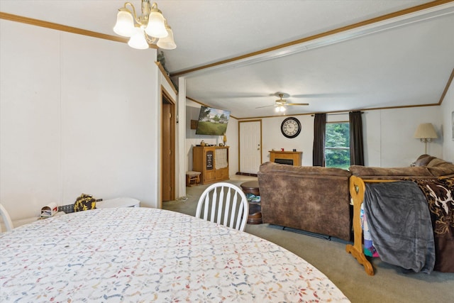 7100 Tripp Rd, Horton, MI 49246 - dining area featuring carpet flooring, a chandelier, ceiling fan, and crown molding