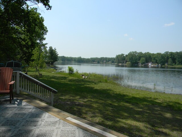 67 S Emerson Dr, Branch, MI 49402 - water view with a heavily wooded area