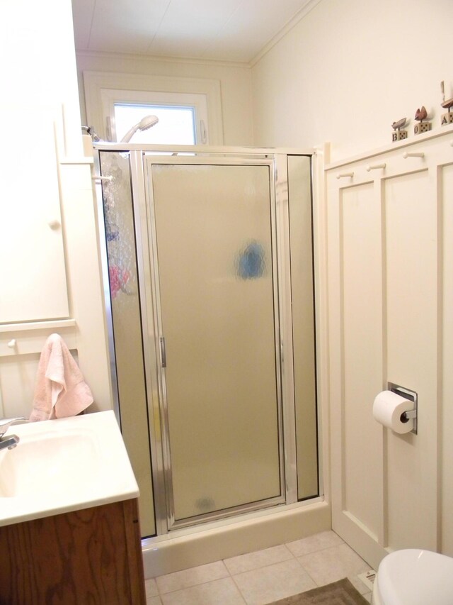 67 S Emerson Dr, Branch, MI 49402 - bathroom featuring vanity, a shower stall, tile patterned floors, and toilet