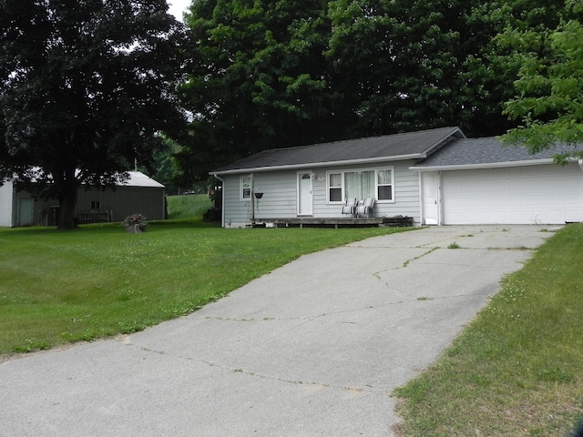 1097 Oliverda Rd, Sherwood, MI 49089 - view of front of house with a garage, a front lawn, and concrete driveway