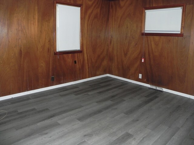 1097 Oliverda Rd, Sherwood, MI 49089 - unfurnished room with wood finished floors, plenty of natural light, and wood walls