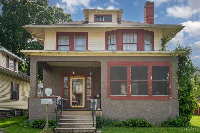 234 N Jackson St, Bay City, MI 48708 - traditional style home featuring a chimney and stucco siding