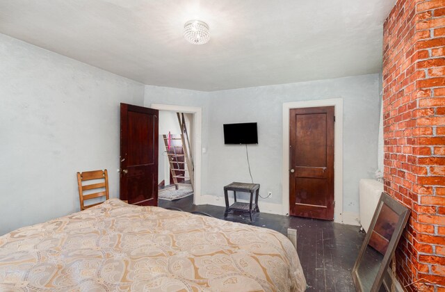 234 N Jackson St, Bay City, MI 48708 - bedroom with wood finished floors