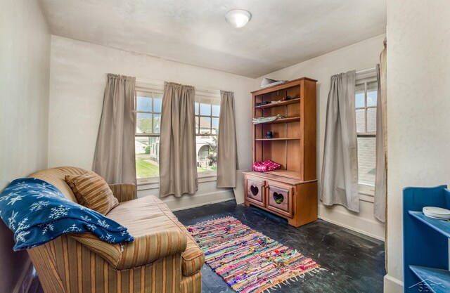 234 N Jackson St, Bay City, MI 48708 - living area featuring baseboards
