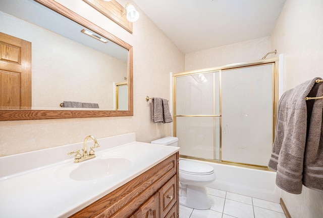 53029 Meadow View Ln, Paw Paw, MI 49079 - bathroom featuring vanity, toilet, bath / shower combo with glass door, and tile patterned floors