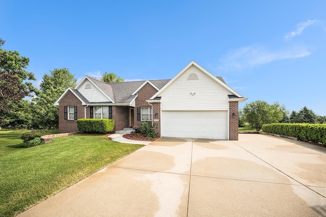 53029 Meadow View Ln, Paw Paw, MI 49079 - view of front of house featuring concrete driveway, brick siding, a front yard, and an attached garage