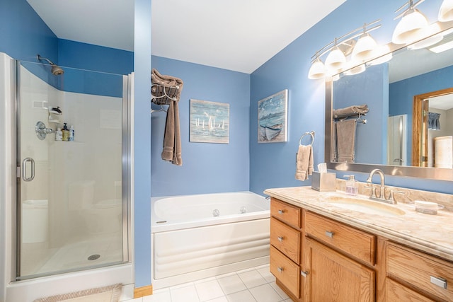 53029 Meadow View Ln, Paw Paw, MI 49079 - full bath with a stall shower, tile patterned floors, a garden tub, and vanity