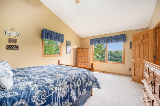 53029 Meadow View Ln, Paw Paw, MI 49079 - carpeted bedroom with baseboards, a ceiling fan, and high vaulted ceiling
