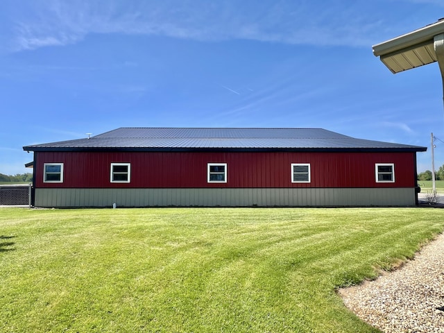 5781 S Waldron Rd, Pittsford, MI 49271 - view of home's exterior with a yard, an outbuilding, an outdoor structure, and metal roof