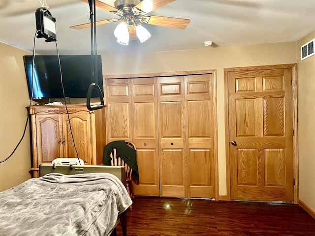 5781 S Waldron Rd, Pittsford, MI 49271 - bedroom with dark wood-style floors and ceiling fan