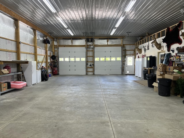 5781 S Waldron Rd, Pittsford, MI 49271 - garage featuring freestanding refrigerator