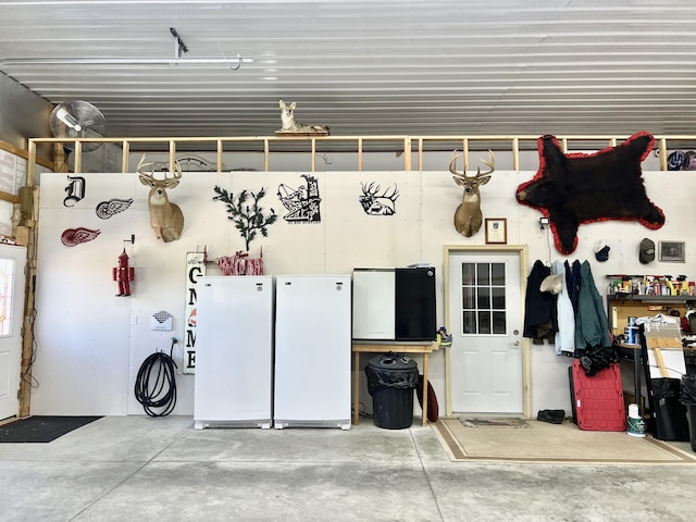 5781 S Waldron Rd, Pittsford, MI 49271 - garage with freestanding refrigerator