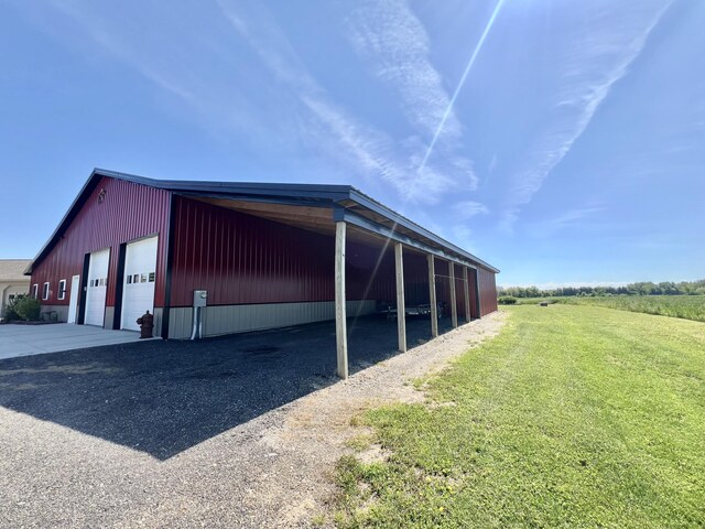 5781 S Waldron Rd, Pittsford, MI 49271 - view of pole building with a yard