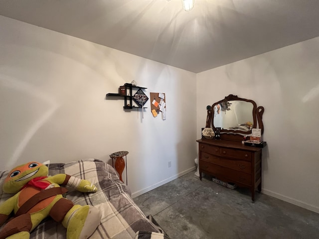 5781 S Waldron Rd, Pittsford, MI 49271 - bedroom with unfinished concrete floors and baseboards