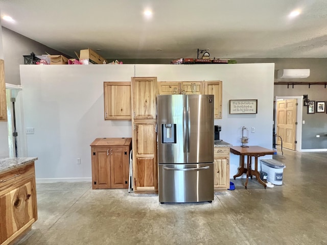 5781 S Waldron Rd, Pittsford, MI 49271 - kitchen with stainless steel fridge with ice dispenser, concrete floors, light countertops, baseboards, and a wall unit AC