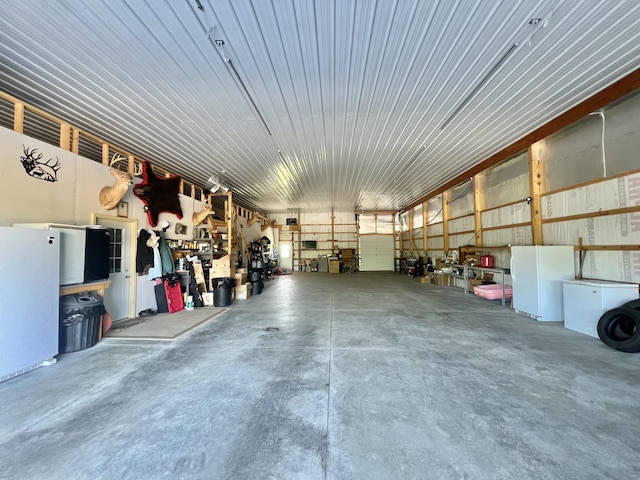 5781 S Waldron Rd, Pittsford, MI 49271 - garage featuring freestanding refrigerator