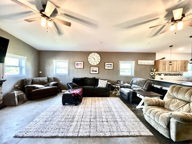 5781 S Waldron Rd, Pittsford, MI 49271 - living area featuring ceiling fan and vaulted ceiling