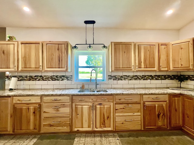 5781 S Waldron Rd, Pittsford, MI 49271 - kitchen featuring a sink, tasteful backsplash, light stone counters, and light brown cabinetry