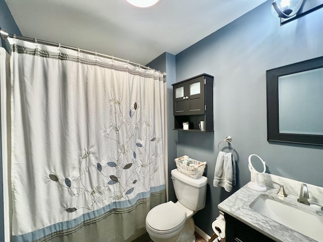 5781 S Waldron Rd, Pittsford, MI 49271 - full bath featuring toilet, vanity, and a shower with shower curtain