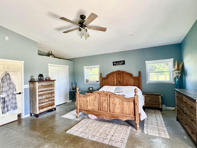 5781 S Waldron Rd, Pittsford, MI 49271 - bedroom with finished concrete flooring, a closet, baseboards, and vaulted ceiling