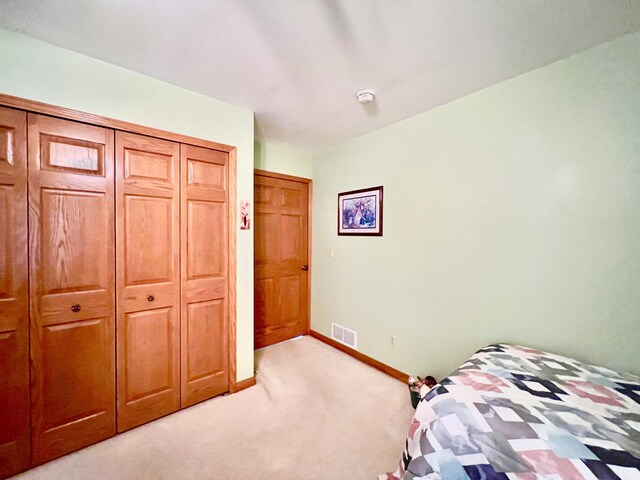 5781 S Waldron Rd, Pittsford, MI 49271 - bedroom with light carpet and baseboards