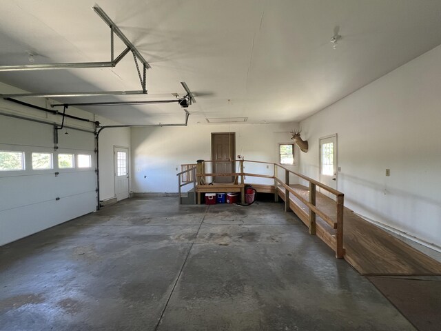 5781 S Waldron Rd, Pittsford, MI 49271 - garage featuring a garage door opener