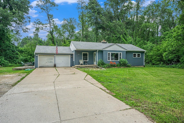 4319 Beckley Rd, Battle Creek, MI 49015 - ranch-style house with a garage, a front yard, concrete driveway, a chimney, and roof with shingles