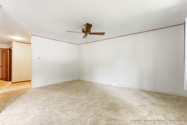 1710 Dykhouse Ave, Grand Haven, MI 49417 - carpeted spare room with ceiling fan and baseboards