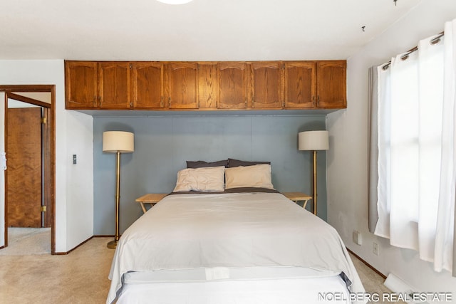 1710 Dykhouse Ave, Grand Haven, MI 49417 - bedroom with light colored carpet and baseboards