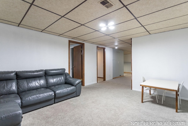 1710 Dykhouse Ave, Grand Haven, MI 49417 - living room with carpet flooring, a paneled ceiling, and baseboards