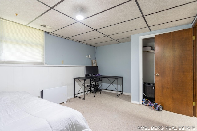 1710 Dykhouse Ave, Grand Haven, MI 49417 - bedroom with carpet flooring, a paneled ceiling, and baseboards