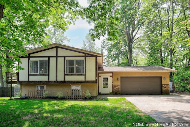 1710 Dykhouse Ave, Grand Haven, MI 49417 - view of front of house featuring brick siding, a garage, concrete driveway, and a front lawn