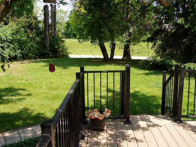 1358 Arroyo Dr, Ypsilanti, MI 48197 - wooden deck featuring a lawn