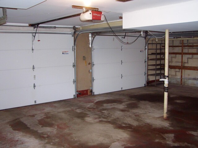 1358 Arroyo Dr, Ypsilanti, MI 48197 - garage featuring a garage door opener