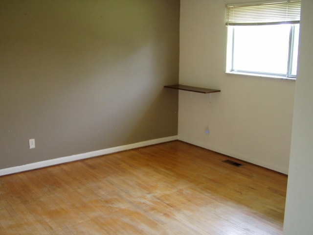 1358 Arroyo Dr, Ypsilanti, MI 48197 - unfurnished room with light wood-style flooring and baseboards