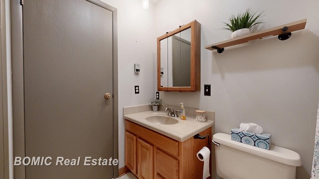 5612 Jay Rd, Vassar, MI 48768 - bathroom with vanity and toilet