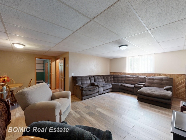5612 Jay Rd, Vassar, MI 48768 - living area with a drop ceiling and wood finished floors