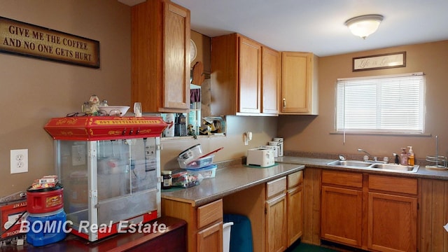 2081 Skiles Dr, Saint Helen, MI 48656 - kitchen featuring a sink and brown cabinetry