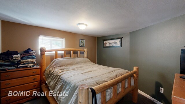 2081 Skiles Dr, Saint Helen, MI 48656 - bedroom featuring baseboards