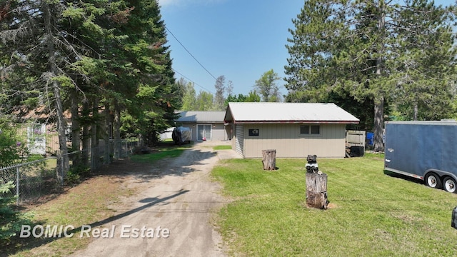 2081 Skiles Dr, Saint Helen, MI 48656 - view of front facade featuring dirt driveway and metal roof