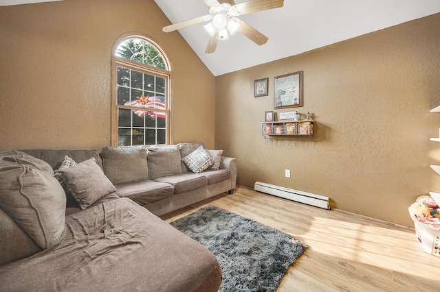 22251 210th Ave, Tustin, MI 49688 - living room with baseboard heating, a textured wall, wood finished floors, lofted ceiling, and a ceiling fan