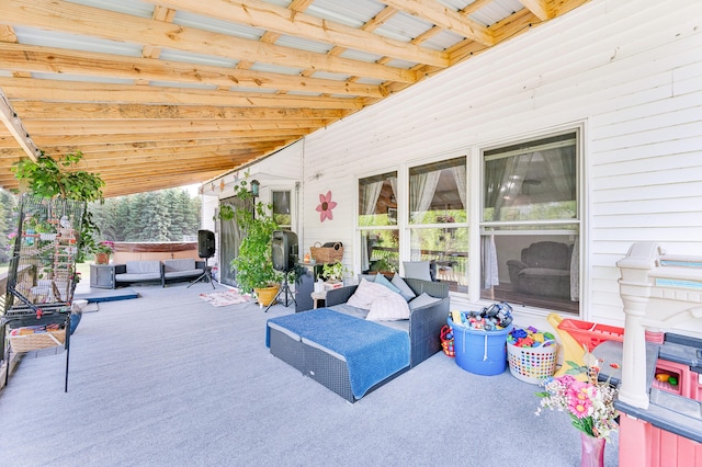22251 210th Ave, Tustin, MI 49688 - view of patio featuring a hot tub, an outdoor hangout area, and a wooden deck