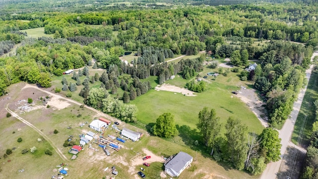 22251 210th Ave, Tustin, MI 49688 - aerial overview of property's location featuring a heavily wooded area