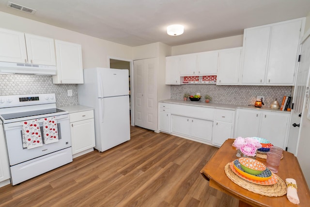1802 Ferry St, Niles, MI 49120 - kitchen featuring white appliances, under cabinet range hood, light countertops, and tasteful backsplash