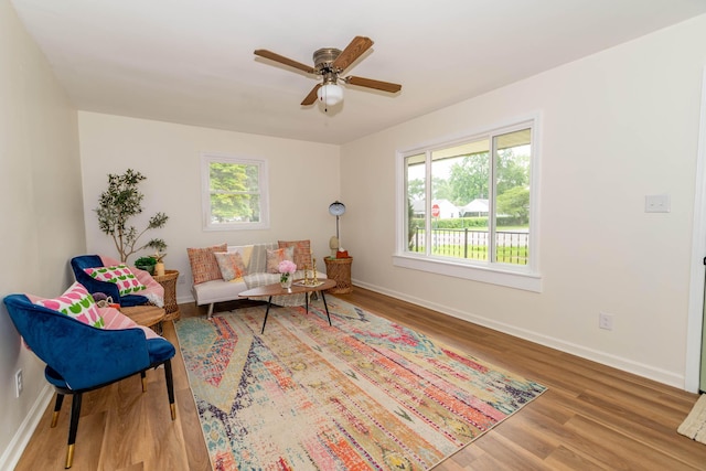 1802 Ferry St, Niles, MI 49120 - living room with baseboards, wood finished floors, and a ceiling fan