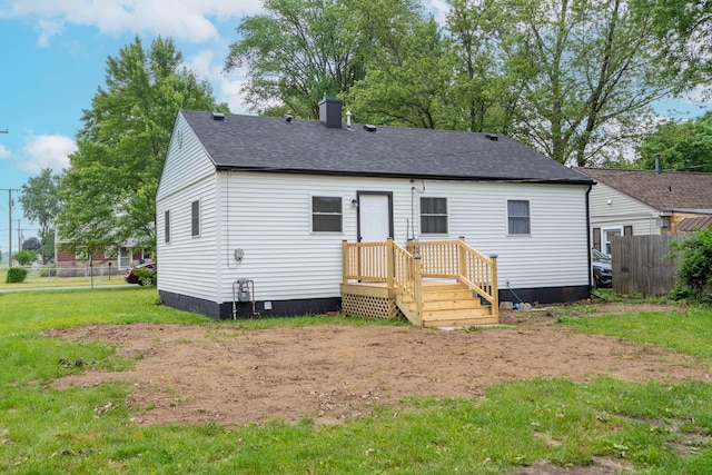 1802 Ferry St, Niles, MI 49120 - back of property with roof with shingles and a chimney