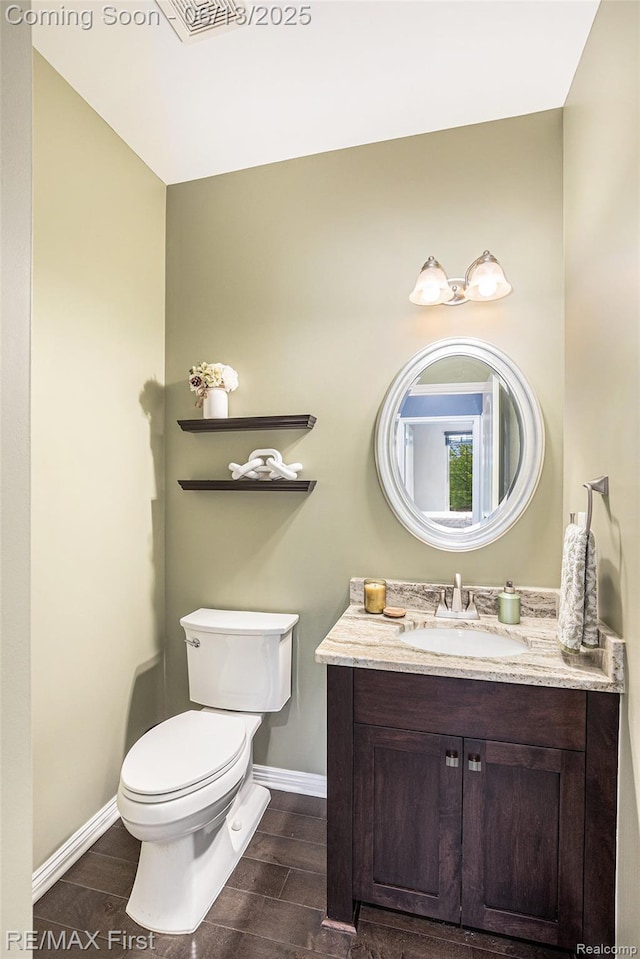 17769 Tiger Dr, Macomb, MI 48042 - half bath featuring vanity and wood tiled floors
