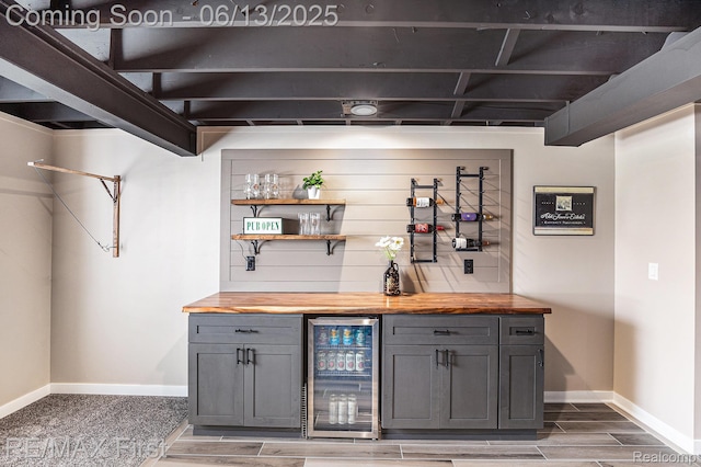 17769 Tiger Dr, Macomb, MI 48042 - indoor dry bar featuring beverage cooler and light wood-type flooring