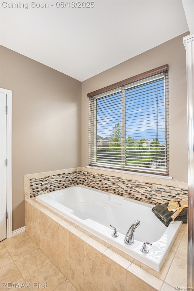 17769 Tiger Dr, Macomb, MI 48042 - full bathroom featuring a bath and tile patterned flooring