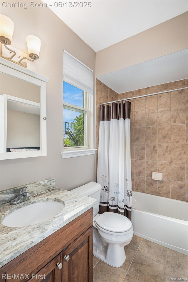 17769 Tiger Dr, Macomb, MI 48042 - full bathroom featuring vanity and shower / bath combo with shower curtain